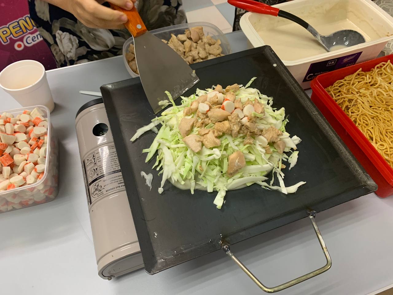Hiroshima-style Okonomiyaki, a traditional cuisine created out of atomic bombing